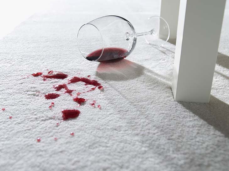 Tache de vin sur tapis 