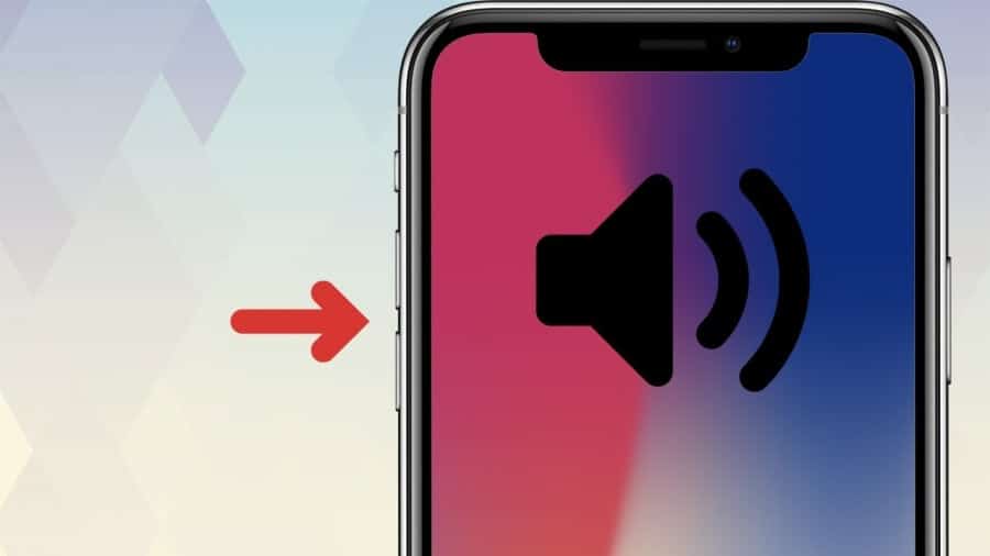 Personne en réunion utilisant discrètement les boutons de volume pour couper une sonnerie